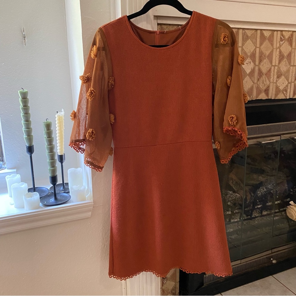 Burnt orange/deep orange dress with lace sleeves and flower details size small